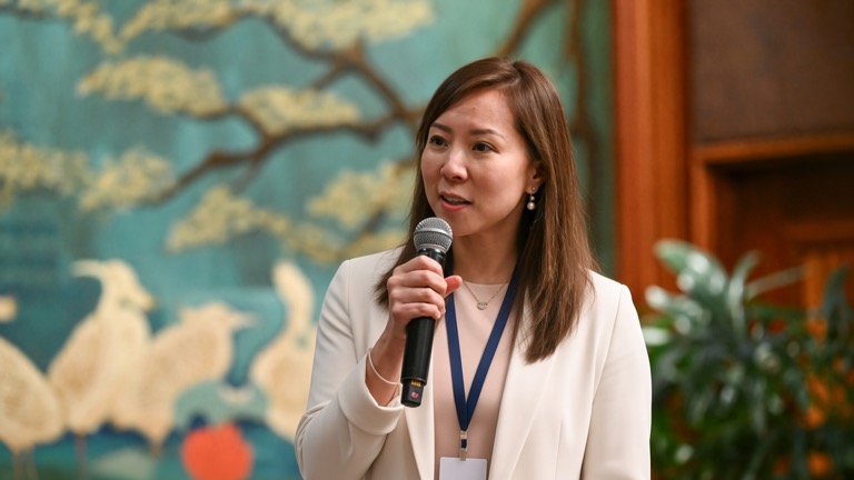 Photo of Sonia Yu speaking
